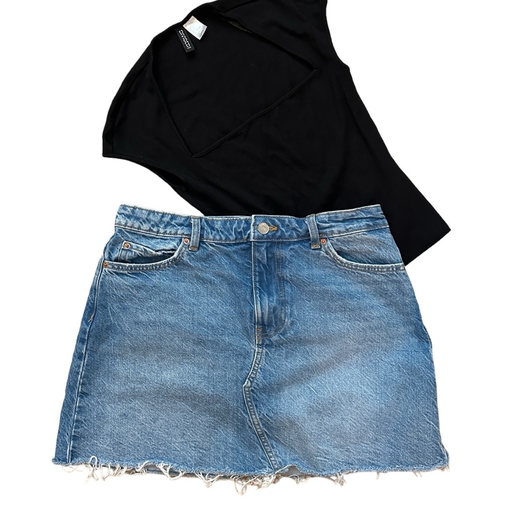 Mini Denim Western Jean Skirt with a frayed bottom.